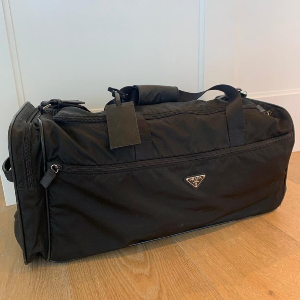 Prada Nylon and Saffiano Travel luggage with wheels